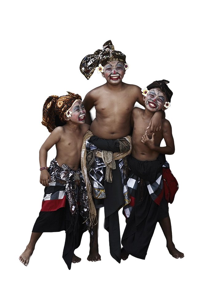 Young Balinese dancers in traditional Baris costume and face paint